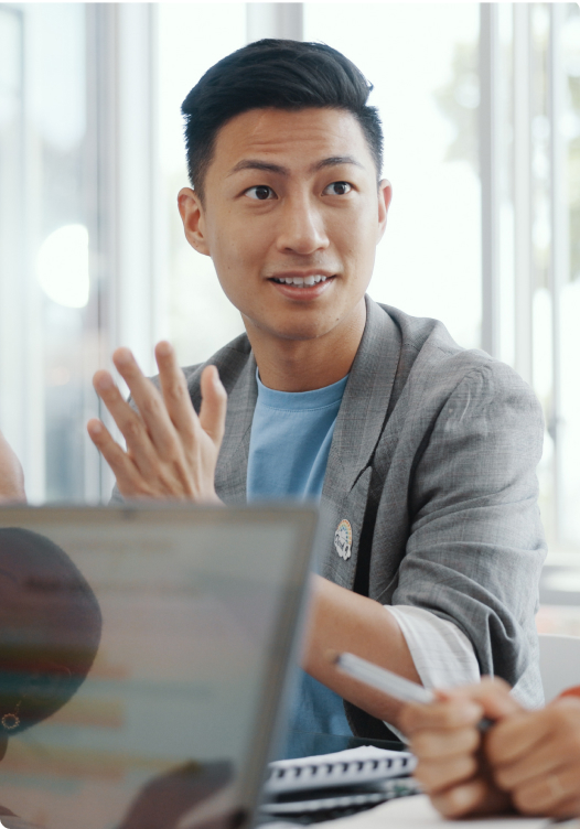 Asian man looking away from camera